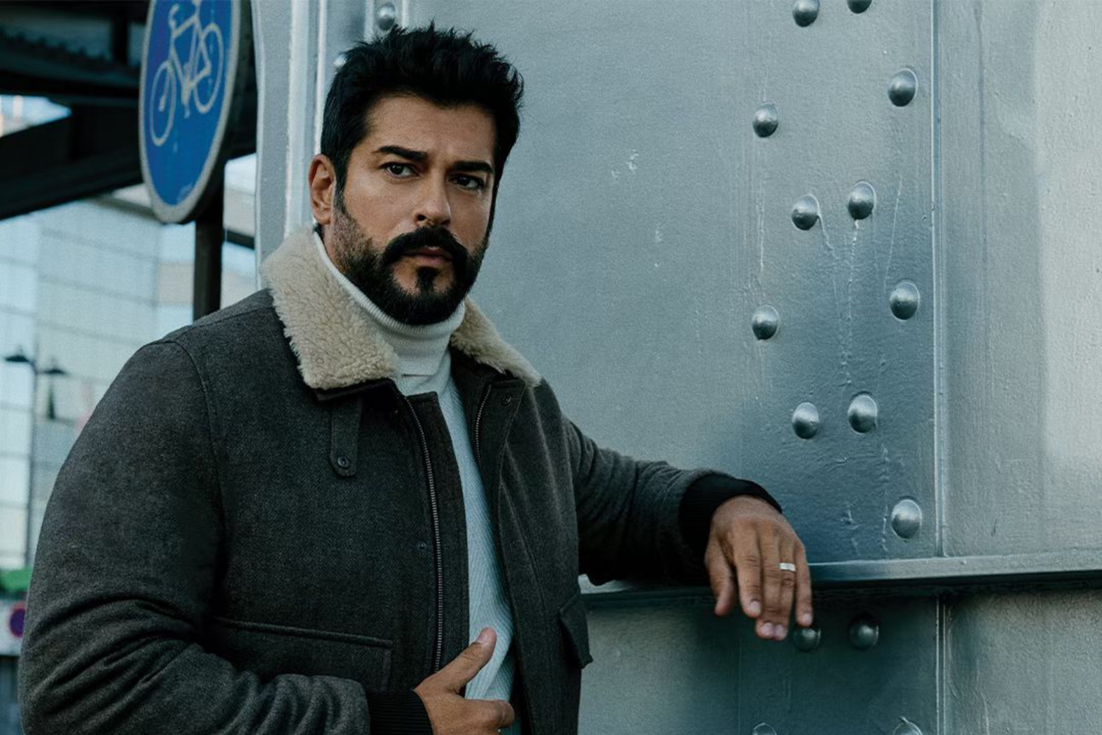 Who is beloved Turkish actor Burak Ozcivit? 3 Burak Ozcivit poses in a stylish coat for a brand advertisement