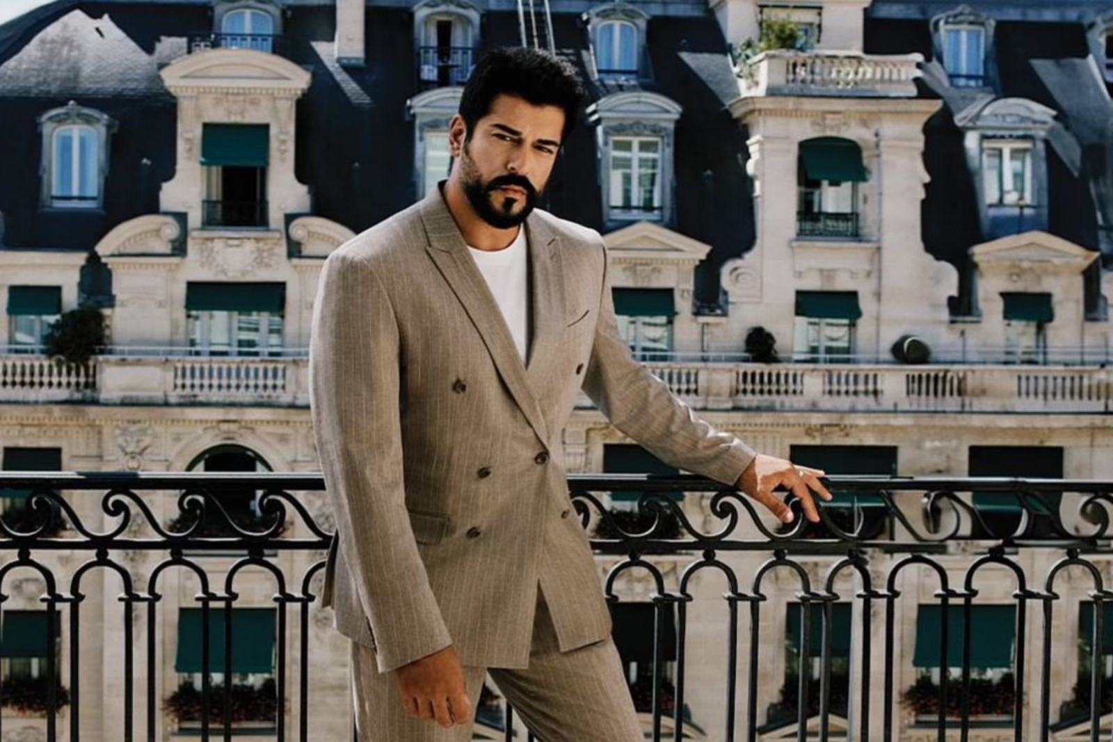 Who is beloved Turkish actor Burak Ozcivit? 2 Burak Ozcivit poses in a stylish suit for a brand advertisement