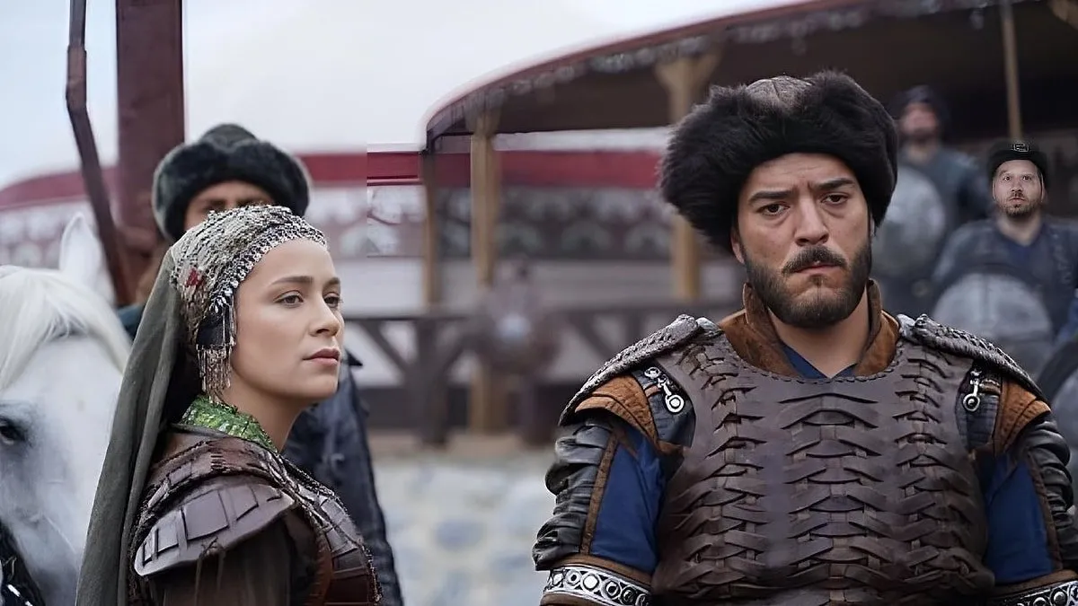 Müjde Çağrı Şensoy and Buse Arslan smiling together behind the scenes of Kuruluş Osman Newborn baby announcement shared by Kuruluş Osman stars