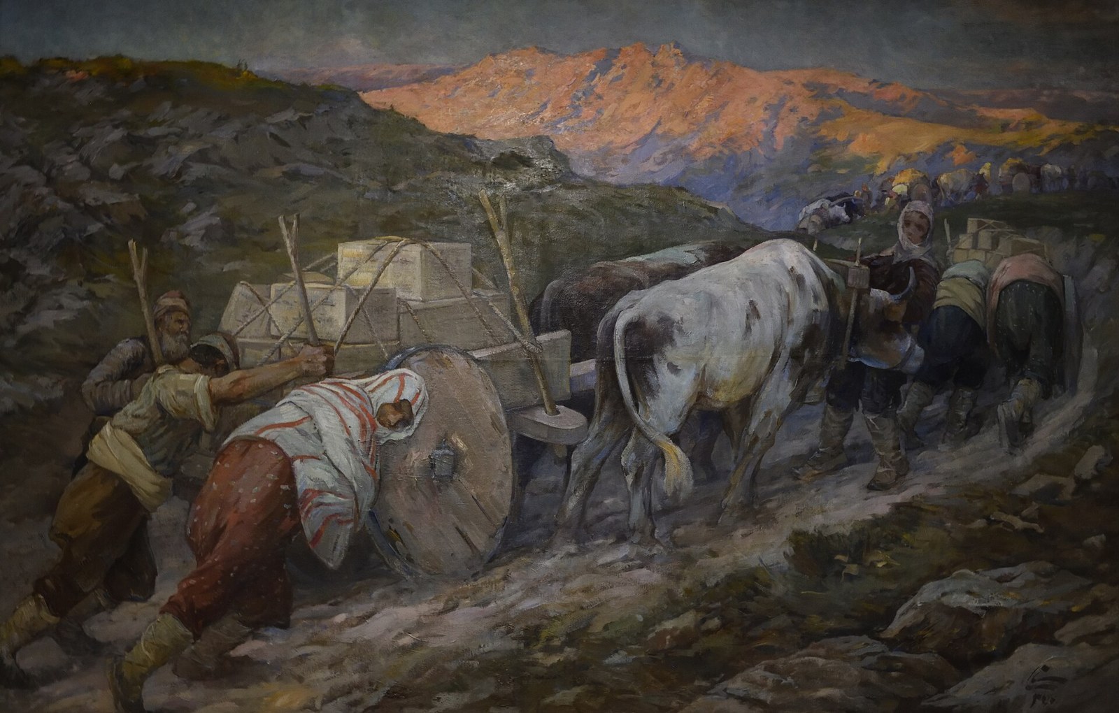 Oil painting of villagers and oxen hauling a crate-laden cart up a rocky mountain path at sunset