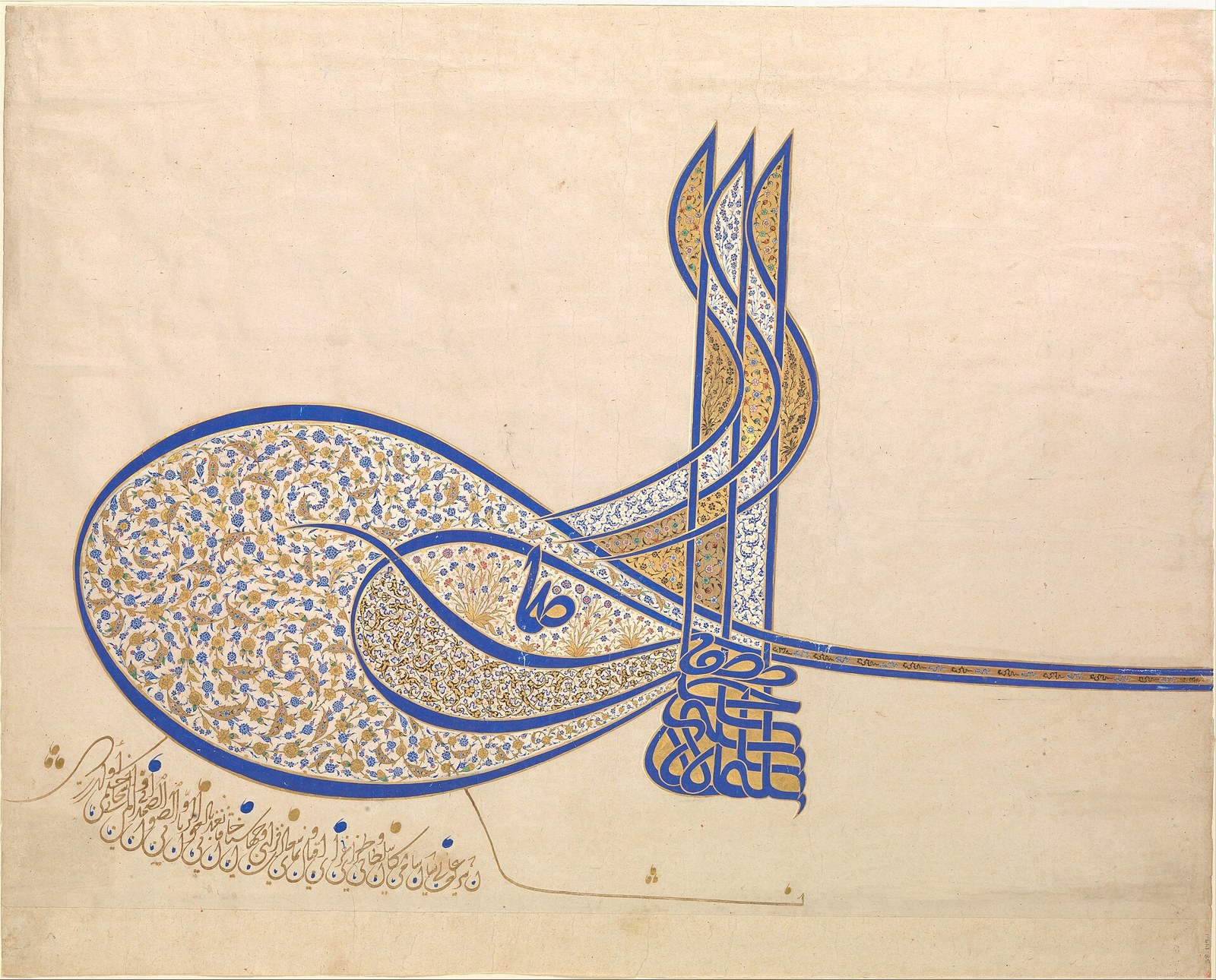 Ornate Ottoman tughra, a sultan's calligraphic monogram, in blue and gold with floral illumination on cream paper